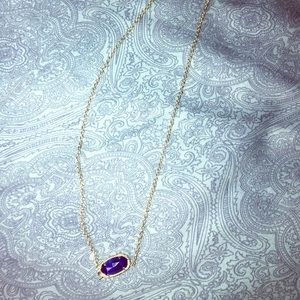 Kendra Scott necklace and earrings.